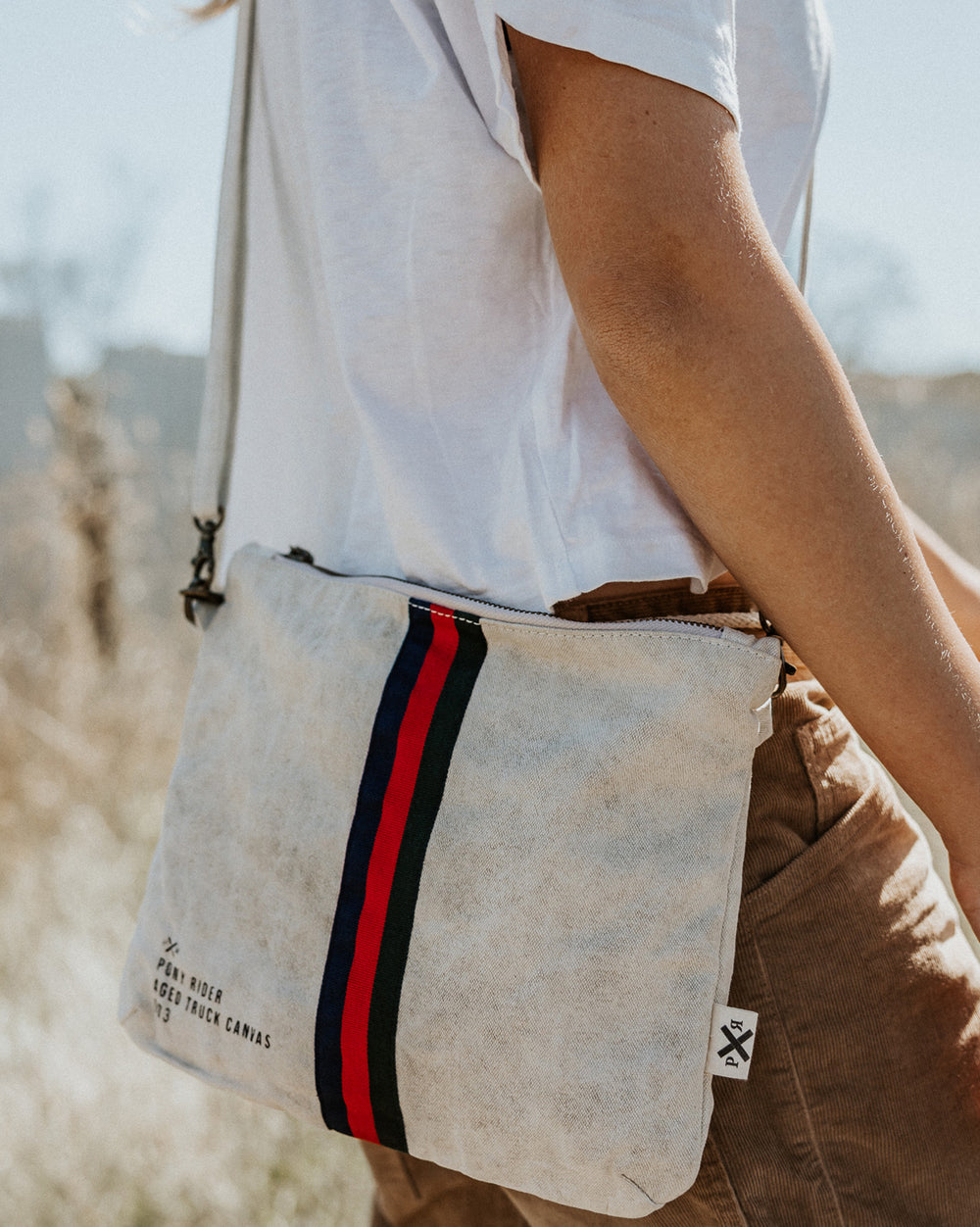 Escapee Clutch Bag / Natural Stripe/ Pony Rider
